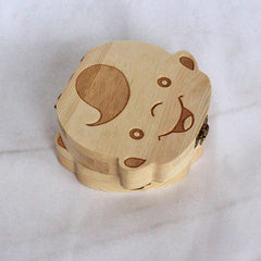 Angled view of closed boy-design wooden baby keepsake box