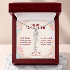 Silver personalized birth flower name necklace for Daughter in a wooden Luxury Box on a marble pedestal
